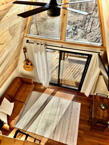 an overhead view of a tiny house with a ceiling fan at The Charlotte A-Frame cabin with mountain views in Wilsonville