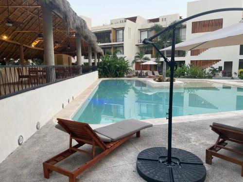 Πισίνα στο ή κοντά στο Hermoso y cómodo departamento