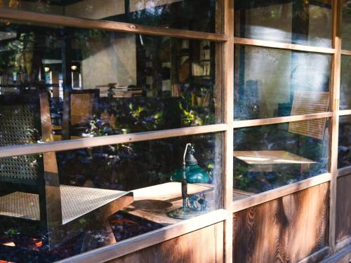 a window view of a table with a lamp on it at LA TERRA NAGANOーVacation STAY 80689v in Shiojiri