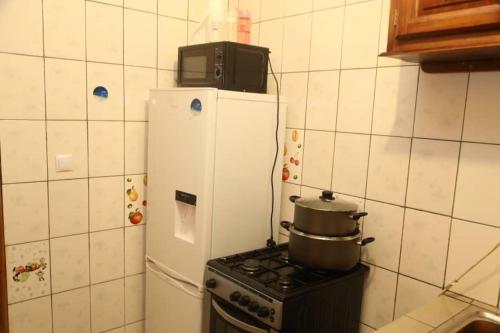 Kuchyň nebo kuchyňský kout v ubytování Fots Appartement