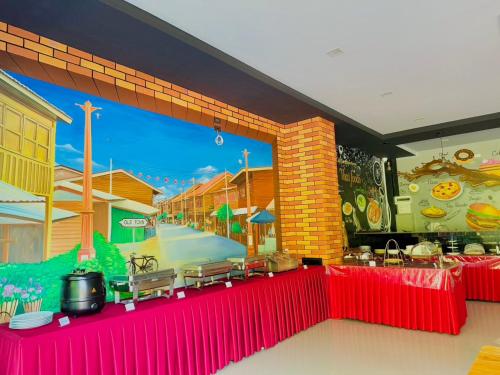 En restaurant eller et andet spisested på Peaceful Resort , Long Beach - Koh Lanta