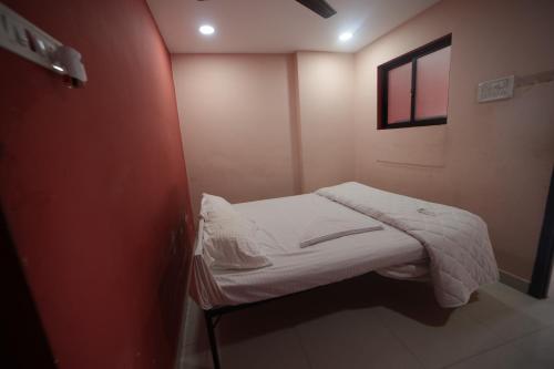 Postel nebo postele na pokoji v ubytování Al Huda