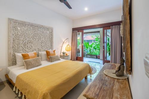 Llit o llits en una habitació de Villa Mara
