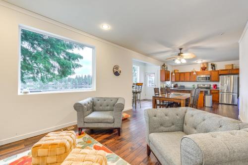 a living room with a couch and chairs and a kitchen at Lakefront Gem with Deck and Grill in Shelton in Shelton