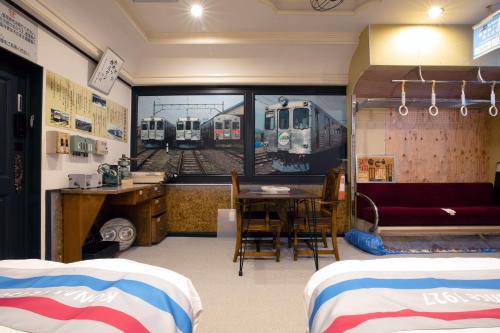 Ένα ή περισσότερα κρεβάτια σε δωμάτιο στο GOOD OLD HOTEL hirosaki