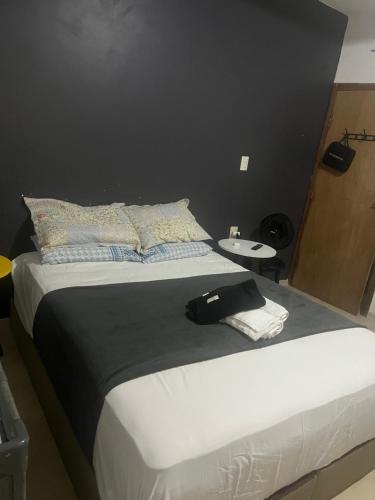Postel nebo postele na pokoji v ubytování Reserva Camburi 2