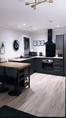 Η κουζίνα ή μικρή κουζίνα στο 2 Bedroom Dreamy apartment in Plymouth!
