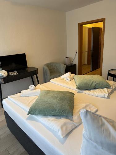 Katil atau katil-katil dalam bilik di Alcor Hotel Feriendorf an der Ostsee