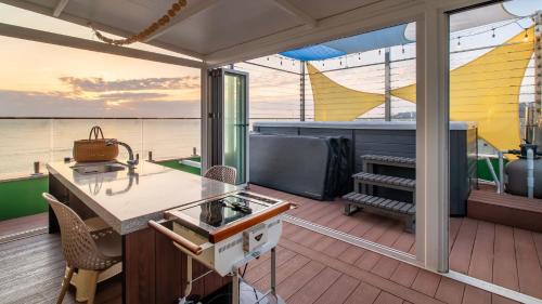 a kitchen on the deck of a boat at Gyeongju Luna Piena Poolvilla in Gyeongju
