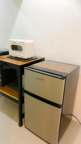 Kuchyň nebo kuchyňský kout v ubytování FACE Transient Rooms