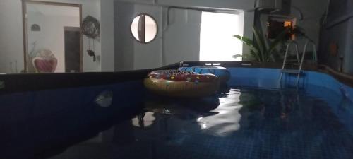 a glass table with a ball on top of it at Cartagena Hotel Boutique - Manga - Tierra del Mar - Colombia in Cartagena de Indias