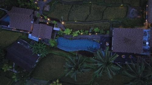 an overhead view of a resort with a swimming pool at Lawani Resort in Tegalalang