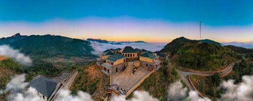 an aerial view of a building on top of a mountain at Cloud Paradise Resort in Lao Cai