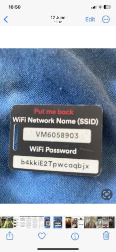 a phone with a sticker on the back of a pair of jeans at King Comfort tv microwave fridge in Upton