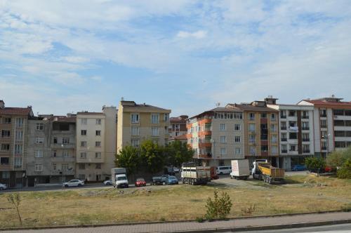 a parking lot in a city with buildings at Classic Suite AA7 in Esenyurt
