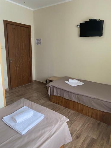 Ένα ή περισσότερα κρεβάτια σε δωμάτιο στο Hotel Forest Star on the Ski Slope