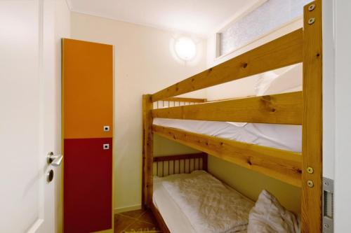 a bunk bed room with two bunk beds in it at Panoramablick über den Oberharz in Braunlage