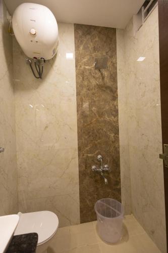 Koupelna v ubytování Hotel Kurunjii Residency