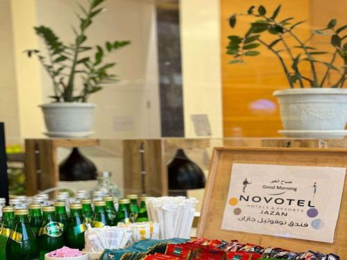 a display of bottles of beer on a table at Novotel Jazan in Jazan