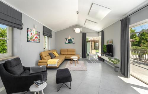 TV a/nebo společenská místnost v ubytování Villa Gemini