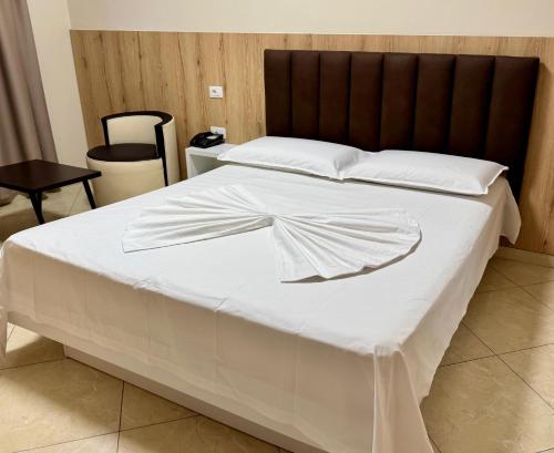 Postel nebo postele na pokoji v ubytování Dida Hotel