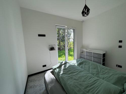 Ένα ή περισσότερα κρεβάτια σε δωμάτιο στο Ferienhaus Traumhafft