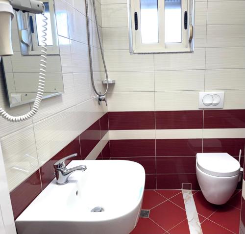 Koupelna v ubytování Dida Hotel