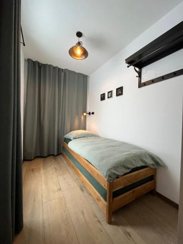 Una cama o camas en una habitación de Chalupa Na vršku