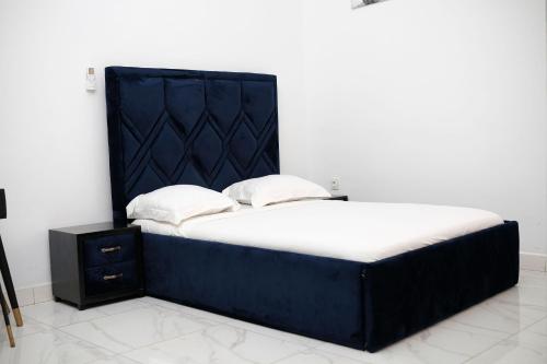 Cama o camas de una habitación en Les jardins de rené