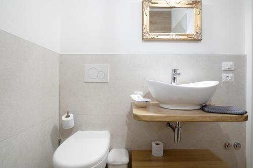 Bilik mandi di Residence Blumar Jesolo Golf Club