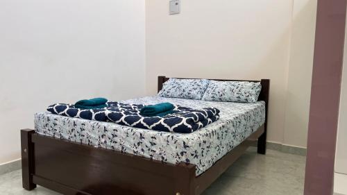 Postel nebo postele na pokoji v ubytování SSN Home Stays in Bangalore near PLAY Arena