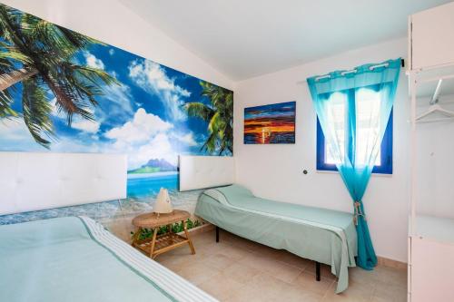 Postel nebo postele na pokoji v ubytování Splendida casa vista mare a Peschici