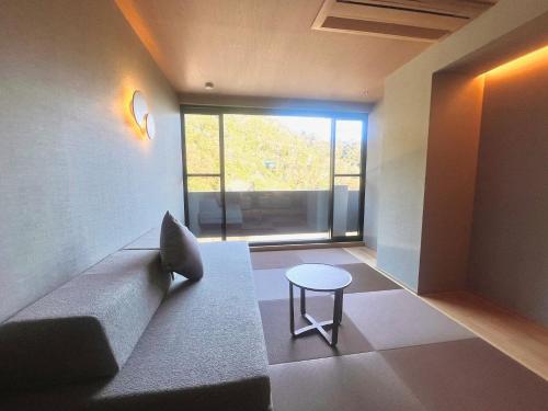 Χώρος καθιστικού στο Hotel Yunomoto