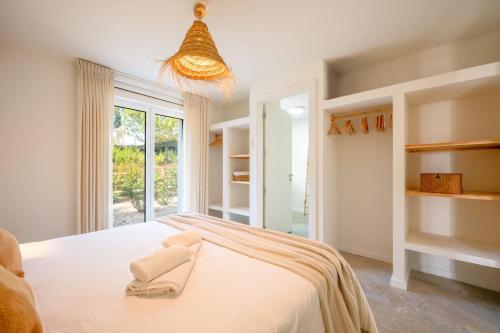 GuestReady - Charming House in Comportaにあるベッド