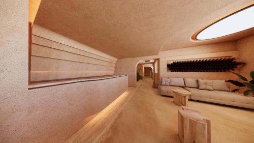 a living room with a couch and a table at La Gaia - Adult Only in Alanya