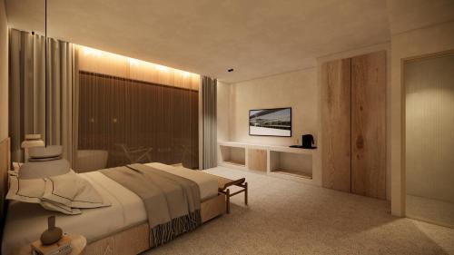 a bedroom with a large bed and a large window at La Gaia - Adult Only in Alanya