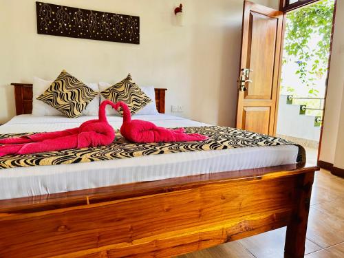Una cama o camas en una habitación de Ella Festoon