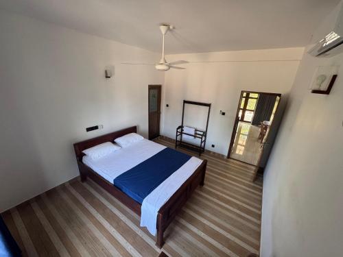 Postel nebo postele na pokoji v ubytování Aruna homestay