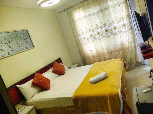 Voodi või voodid majutusasutuse Hongyuan primier hotel toas
