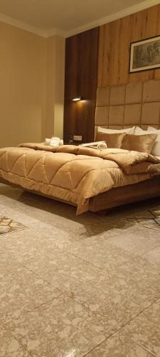 a bedroom with a large bed in a room at MEDINA ORAN in Oran