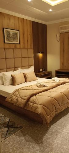 a bedroom with a large bed in a room at MEDINA ORAN in Oran
