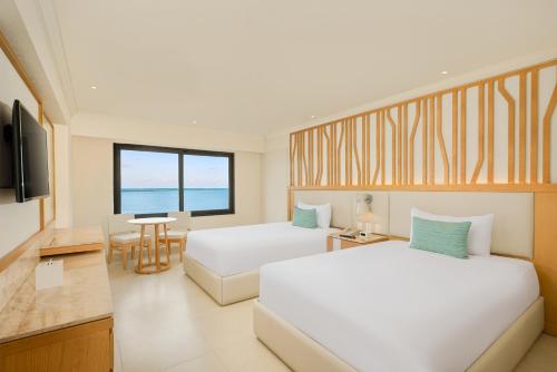 Postel nebo postele na pokoji v ubytování Royal Solaris Cancun - All Inclusive