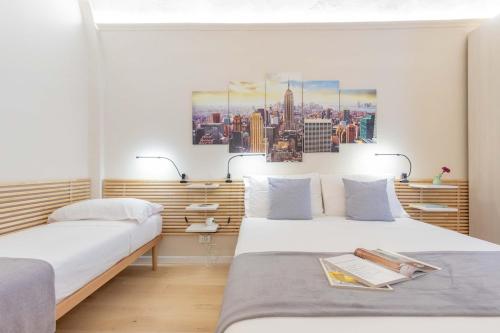 Ένα ή περισσότερα κρεβάτια σε δωμάτιο στο Casa il Mercante