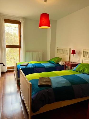 Postel nebo postele na pokoji v ubytování Casa exclusiva l Chimenea l Wifi l Garaje l Vistas