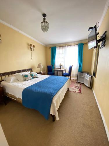 Postel nebo postele na pokoji v ubytování Hostal Gipuzkoa