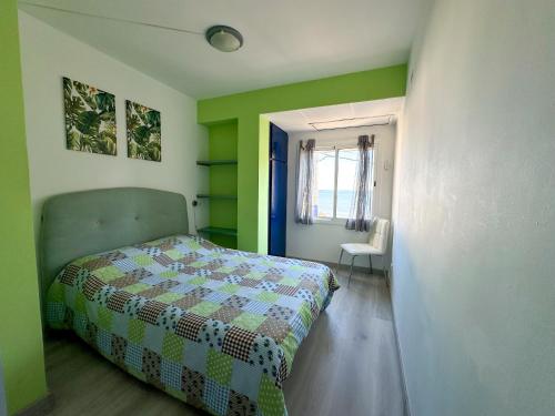 Katil atau katil-katil dalam bilik di Apartamentos Capri-Playa