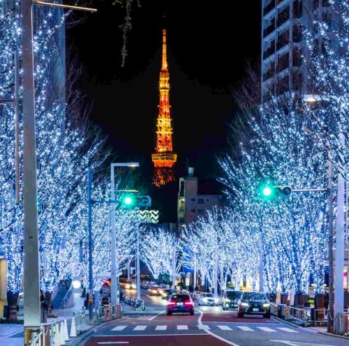 a city street with christmas lights and the eiffel tower at Alo BnB 9 - Near ROPPONGI, GINZA, SHINJUKU, SHIBUYA - Self check-in in Tokyo