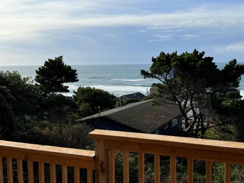 a view of the ocean from the deck of a house at Whale Watch in Lincoln City