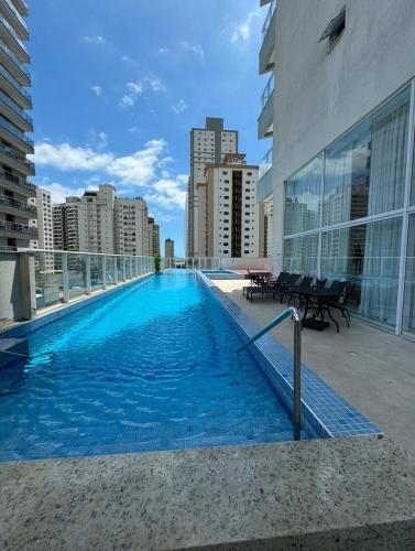 La alberca dentro o cerca de Loft vista Mar - Entre Itajaí e Balneário Camboriú