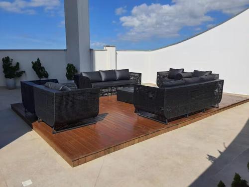 Un lugar para sentarse en Loft vista Mar - Entre Itajaí e Balneário Camboriú